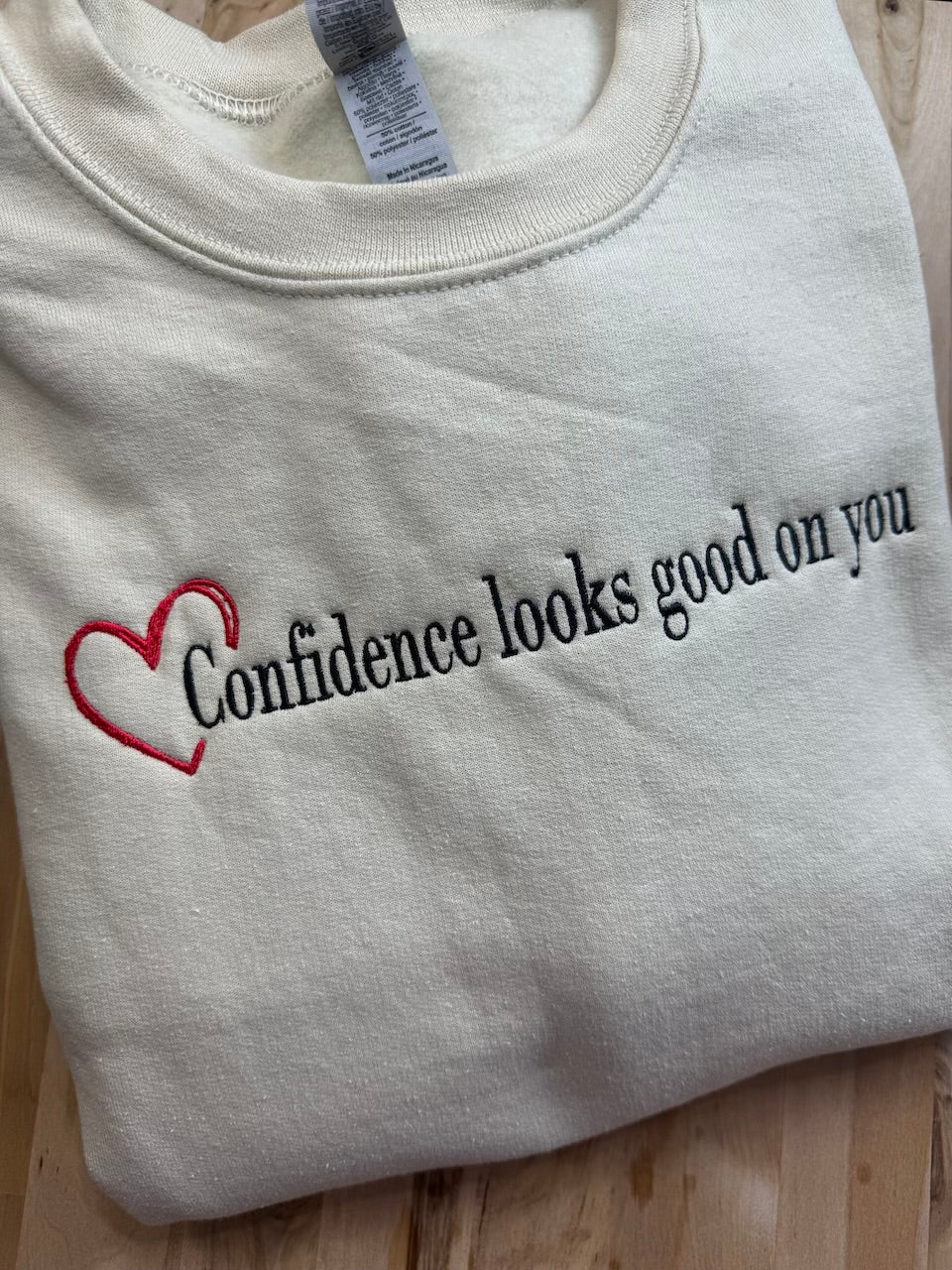 Confidence looks good on you crewneck with heart